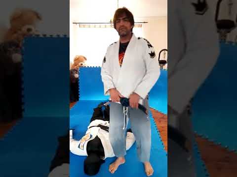 Professor Arlans Siqueira teaches how to get fit with the grappling dummy.