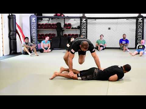 Detaining an opponent on the ground