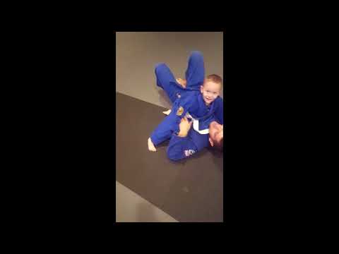 Black Label  Cubs putting their BJJ skills to work against the coaches