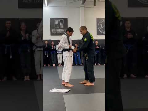 Prof. Leka getting promoted to 6th degree Black Belt by Master Leo Vieira