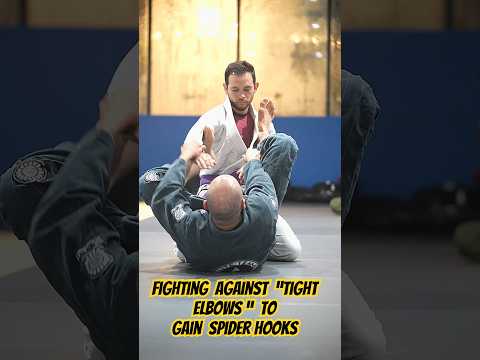 Force the spider hooks against tight elbow￼s.