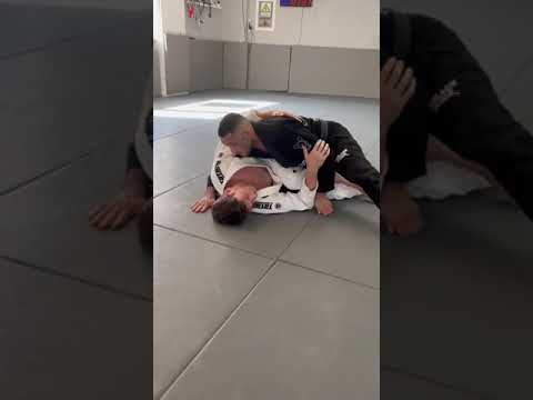 Knee Cut Pass over folded legs from Headquarters Position