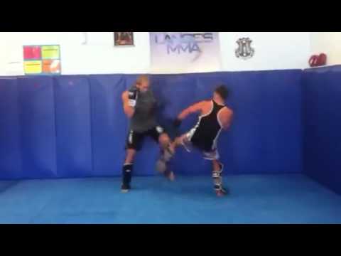 Langes MMA - Thai Kickboxing - Slips off the jab and straight right with follow ups.
