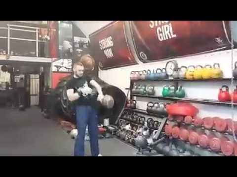 48kg kettlebell overhead waiter walk and half snatch.