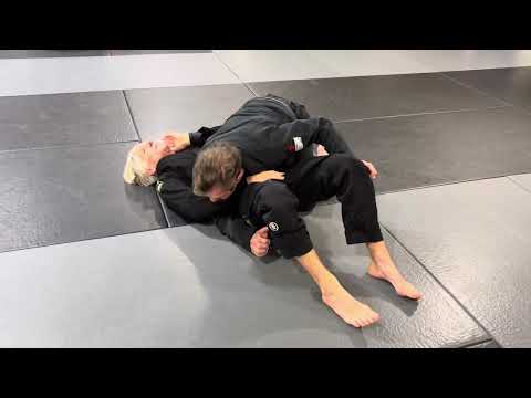 Back escape on the choking arm side