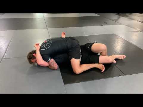 Half guard escape, to head and arm choke - no gi