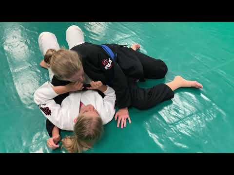 Scarf-hold escape to arm bar