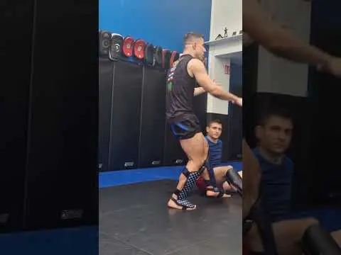 Jose Vieira showing how to sweep inside of the clinch in Muay Thai.