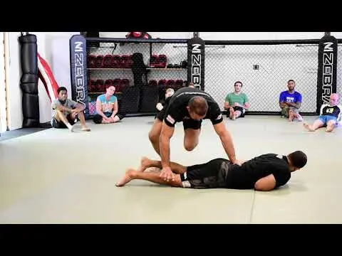 Detaining an opponent on the ground