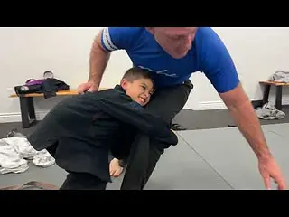 Principal Wrestles Kid
