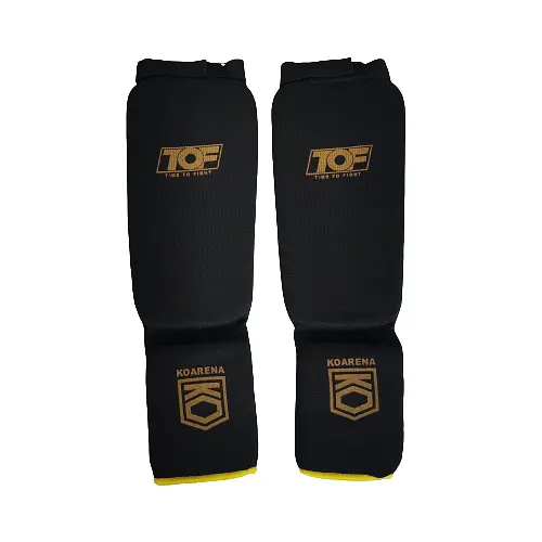 KOARENA Espinilleras Tubulares TOF Negro-Dorado