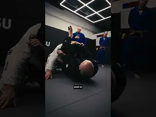 Professor Paul breaking down the triangle choke..