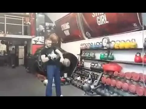 48kg kettlebell overhead waiter walk and half snatch.
