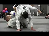 Leka Vieira rolling with Checkmat founder Leo Vieira after being promoted to 5th Degree black belt