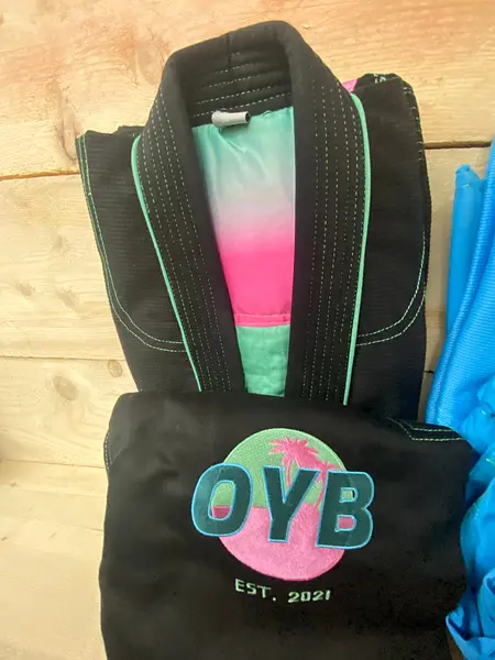 Gi and 2 Rashguards and a bag